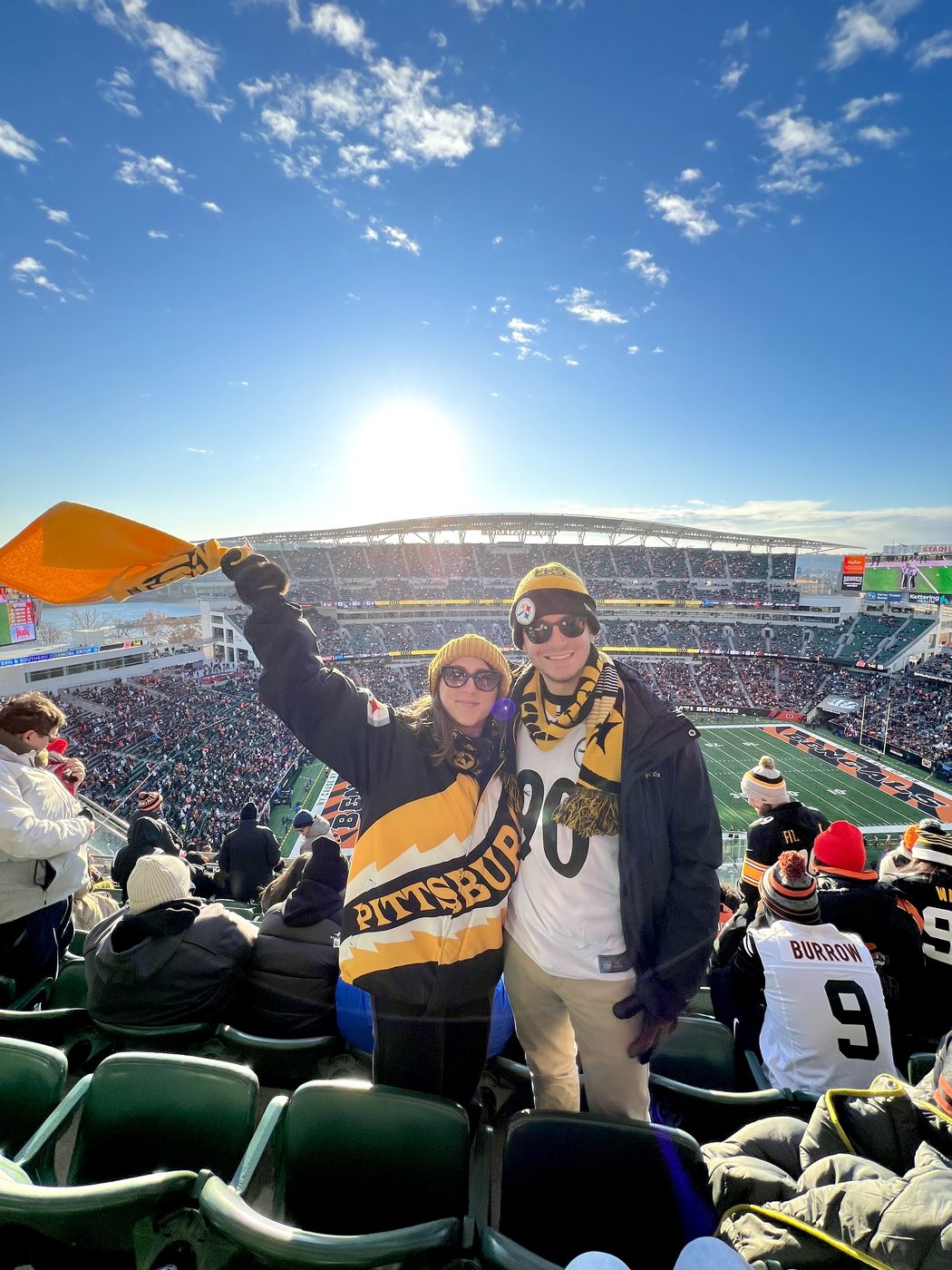 Emily and her husband Tony at a football game